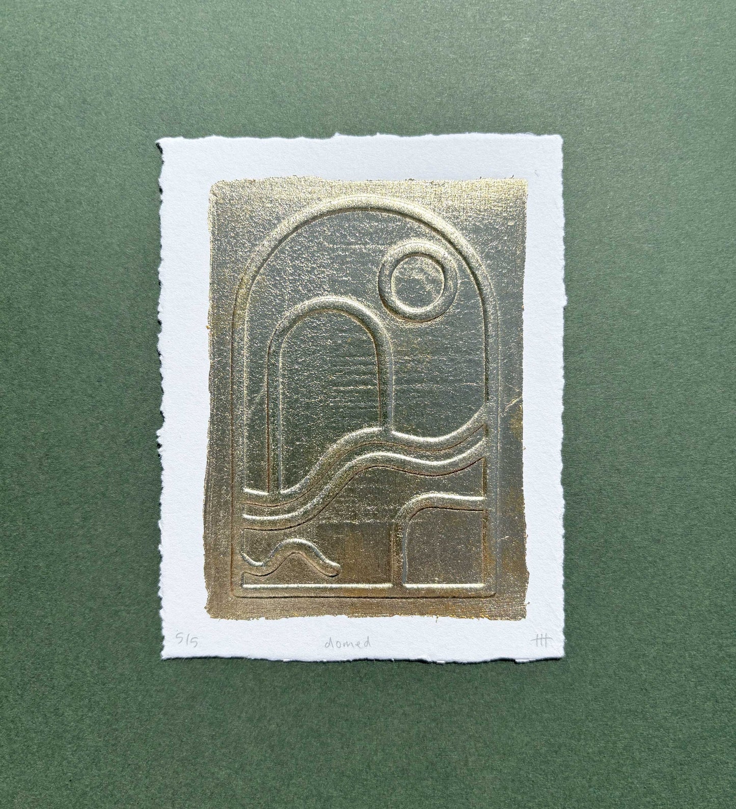 "Domed" metallic leaf embossing
