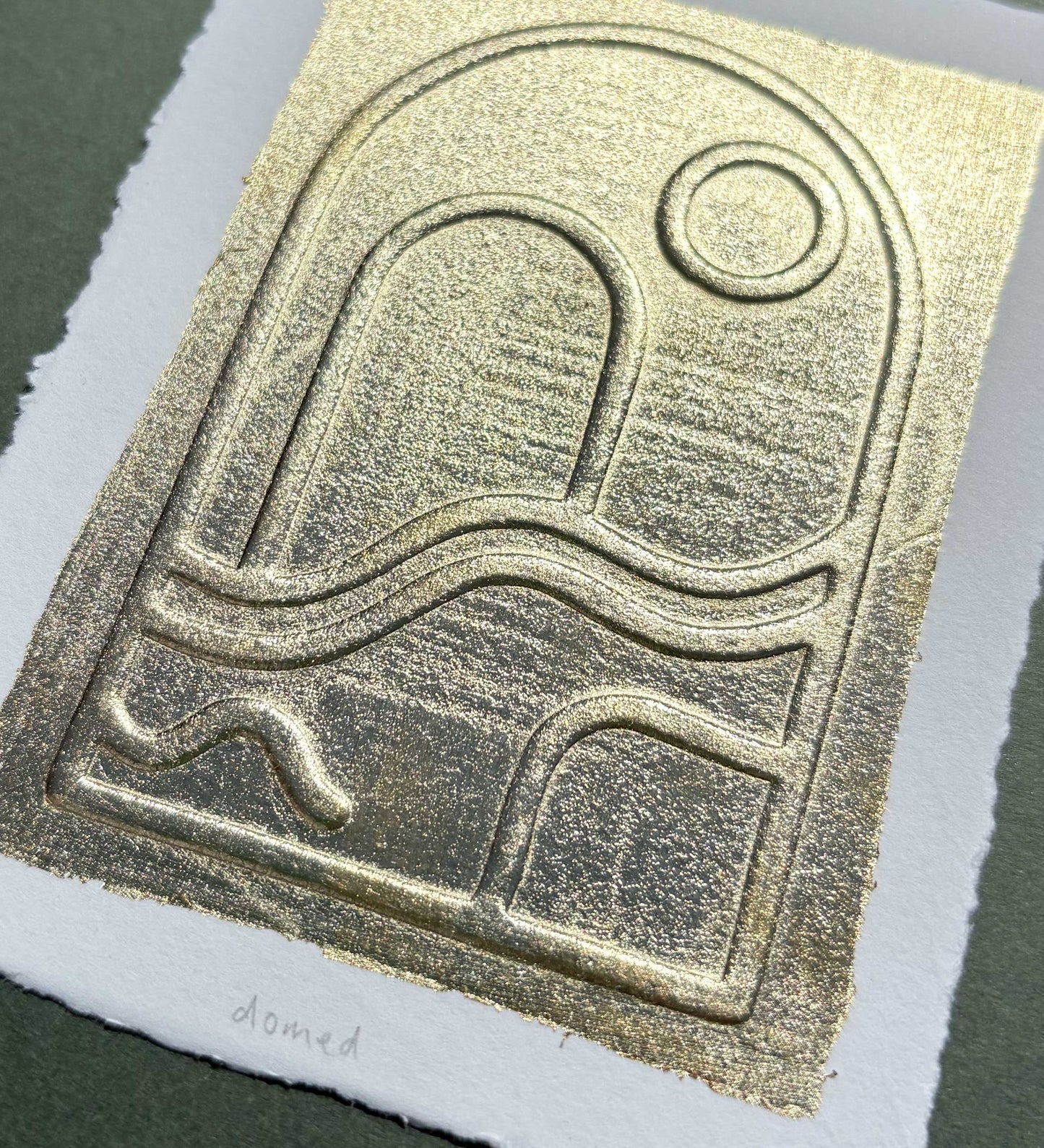 "Domed" metallic leaf embossing